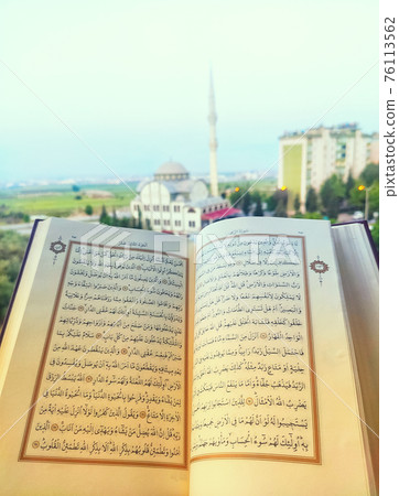 The Quran opened for reading The Quran opened for reading 76113562