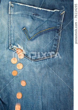 Hole in a pocket money loss concept Hole in a pocket money loss concept 76114295