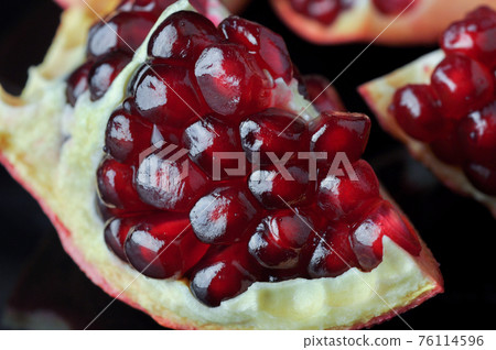 Pomegranate fruit close up. 76114596