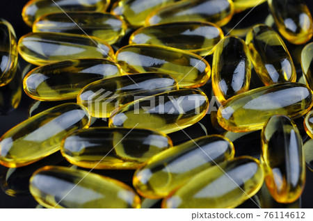 Capsules of fish oil. Omega 3. Capsules of fish oil. Omega 3. 76114612