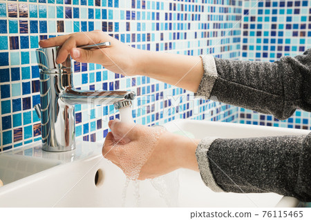 Child washing hands protective measures against coronavirus germ and bacteria spreading Child washing hands protective measures against coronavirus germ and bacteria spreading 76115465
