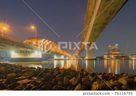 Rama 3 bridge and Chao Phraya River in structure of suspension architecture concept, Urban city, Bangkok. Downtown area at night, Thailand. Rama 3 bridge and Chao Phraya River in structure of suspension architecture concept, Urban city, Bangkok. Downtown area at night, Thailand. 76116795