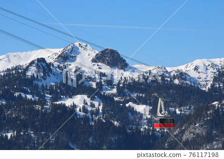 Chaserrugg cable car and snow covered mountains. 76117198