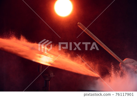 Drummer's rehearsing on drums before rock concert. Man recording music on drumset in studio 76117901