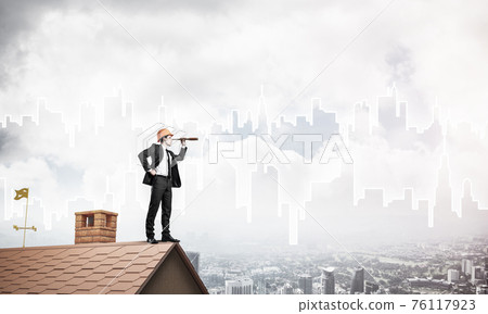 Engineer man standing on roof and looking in spyglass. Mixed med 76117923