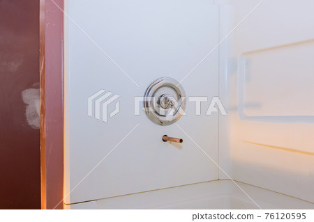 Home construction with copper pipe in the wall on new tap bathroom 76120595