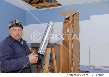 Air hvac system installation under inside ceiling before interior finishing. 76120848