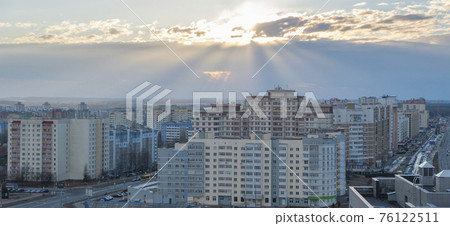 Minsk roofs of houses at sunset 76122511