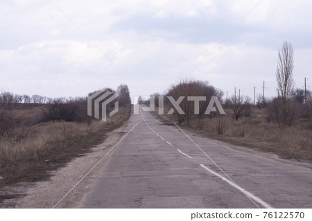 Patches on the site of the pits after cheap repairs. 76122570