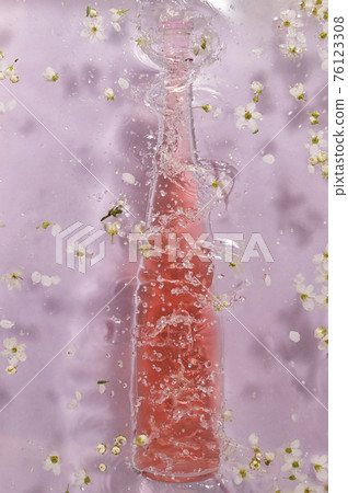 Splash Bottle Of Pink Rose Wine Splash Bottle Of Pink Rose Wine 76123308