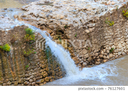 Small waterfall on mountain river in Kesme Bogaz canyon, Antalya province in Turkey Small waterfall on mountain river in Kesme Bogaz canyon, Antalya province in Turkey 76127601