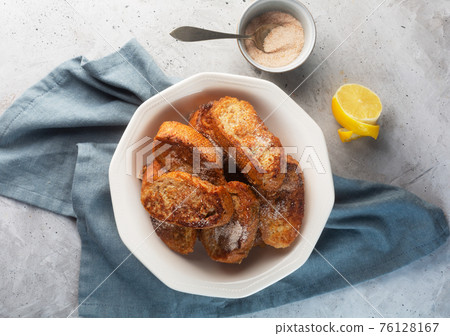 Traditional Spanish torrijas. Dessert for Christmas time or Pascua in Spain Traditional Spanish torrijas. Dessert for Christmas time or Pascua in Spain 76128167