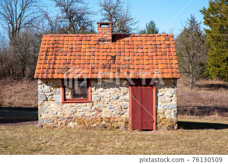 Stone cottage summer kitchen on a colonial American farm 76130509