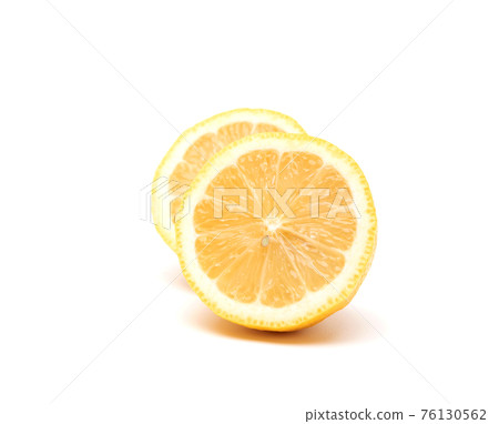 Closeup fresh lemon fruit slice isolated on white background. Healthy food concept Closeup fresh lemon fruit slice isolated on white background. Healthy food concept 76130562