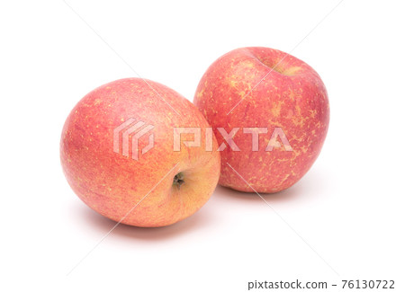 Fuji apples isolated on white background. Healthy food concept Fuji apples isolated on white background. Healthy food concept 76130722
