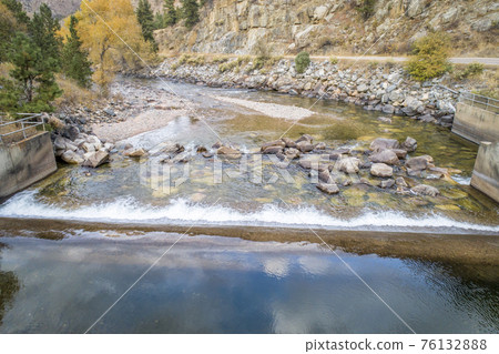 water diversion dam in mountain canyon 76132888