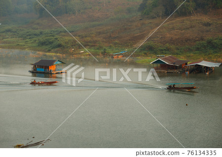 Surreal landscape Foggy and fog float up above river 76134335