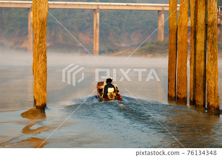 A way of River Life. Villager travel distance by local speed boat 76134348