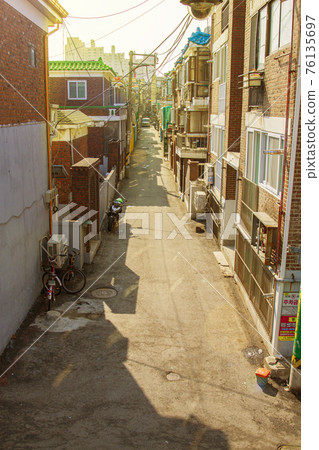 Old residential area alleyway Old residential area alleyway 76135697
