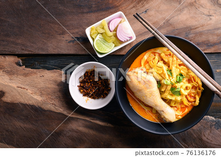 Northern Thai food (Khao Soi), Spicy curry noodles soup with chicken 76136176
