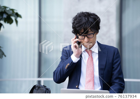 Businessman outdoor nomad worker Businessman outdoor nomad worker 76137934