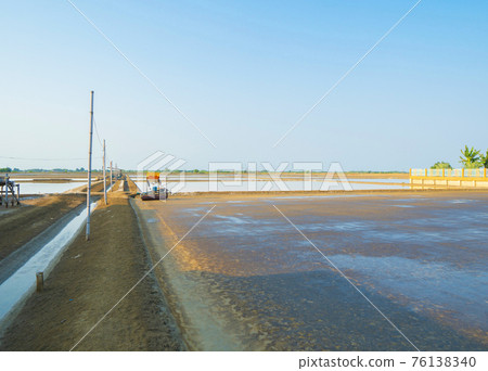 Natural sea salt ponds. Farm field outdoor. Material in traditional industry in Thailand. Asia culture. Agriculture. Natural sea salt ponds. Farm field outdoor. Material in traditional industry in Thailand. Asia culture. Agriculture. 76138340