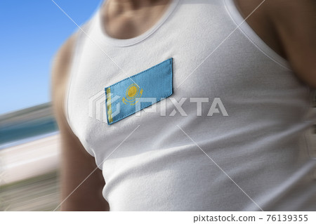 The national flag of Kazakhstan on the athlete's chest 76139355