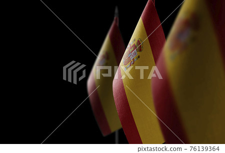 Small national flags of the Spain on a black background Small national flags of the Spain on a black background 76139364