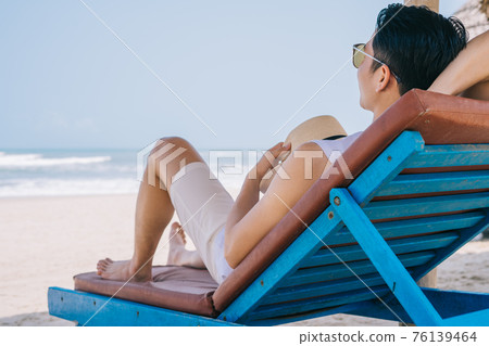 Man, sea, summer vacation 76139464