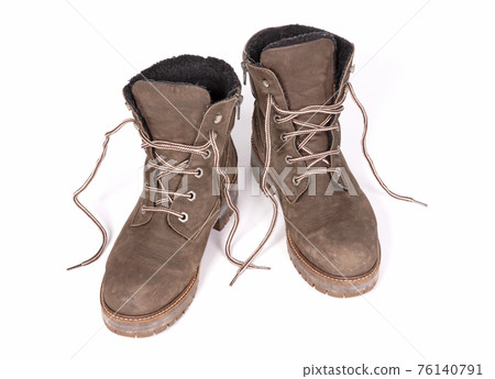 Green boots isolated on white background Green boots isolated on white background 76140791