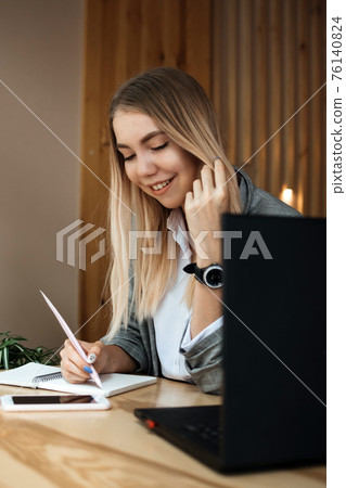 Copywriter, content creator, Remote Copywriting. Young woman freelancer typing on keyboard using laptop computer in cafe, office. Copywriter working online at workplace Copywriter, content creator, Remote Copywriting. Young woman freelancer typing on keyboard using laptop computer in cafe, office. Copywriter working online at workplace 76140824