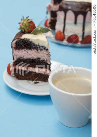 Piece of homemade chocolate cake decorated with fresh strawberries Piece of homemade chocolate cake decorated with fresh strawberries 76146506