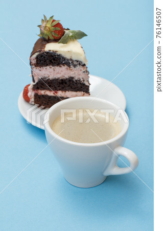 Piece of homemade chocolate cake decorated with fresh strawberries Piece of homemade chocolate cake decorated with fresh strawberries 76146507