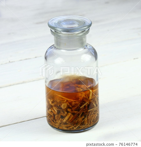 Tincture from dried nettle roots and alcohol Tincture from dried nettle roots and alcohol 76146774