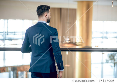 Elegant businessman in a nice suit in the office 76147906