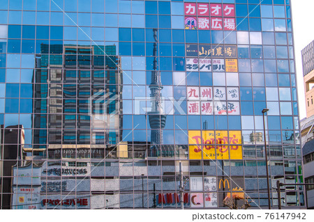 Tokyo cityscape of Japan: Tokyo Sky Tree reflected in the building glass in front of Kinshicho station and the station building "Termina" directly connected to Kinshicho station Tokyo cityscape of Japan: Tokyo Sky Tree reflected in the building glass in front of Kinshicho station and the station building "Termina" directly connected to Kinshicho station 76147942