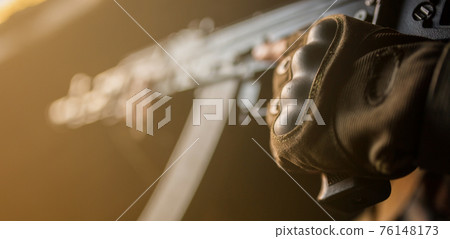 The Arab soldier with the AK-47 Kalashnikov assault rifle The Arab soldier with the AK-47 Kalashnikov assault rifle 76148173