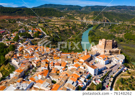 View from drone of Cofrentes cityscape with castle, Valencia, Spain View from drone of Cofrentes cityscape with castle, Valencia, Spain 76148262