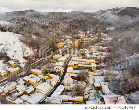 Typical Turkish mountainous village of Muratdere covered with snow 76148487