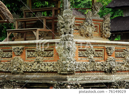 Garuda and Naga stone statues at Taman Ayun Temple Garuda and Naga stone statues at Taman Ayun Temple 76149029