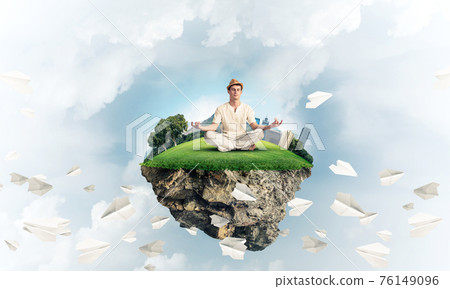 Young man keeping mind conscious. Young man keeping mind conscious. 76149096