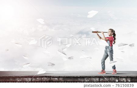 Concept of careless happy childhood with girl exploring this wor Concept of careless happy childhood with girl exploring this wor 76150839