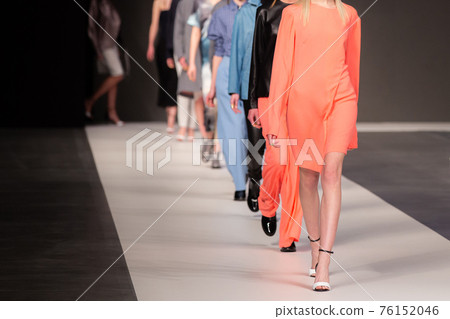 Fashion Show, Catwalk Runway Event, Fashion Week themed photograph. Models walking fashion show finale. 76152046