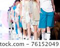 Fashion Show, Catwalk Runway Event, Fashion Week themed photograph. Models walking fashion show finale. 76152049