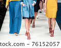 Fashion Show, Catwalk Runway Event, Fashion Week themed photograph. Models walking fashion show finale. 76152057