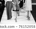 Fashion Show, Catwalk Runway Event, Fashion Week themed photograph. Models walking fashion show finale. 76152058