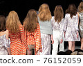 Fashion Show, Catwalk Runway Event, Fashion Week themed photograph. Models walking fashion show finale. 76152059