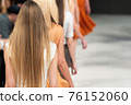 Fashion Show, Catwalk Runway Event, Fashion Week themed photograph. Models walking fashion show finale. 76152060