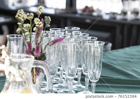 set of dishes for the holiday tall glasses decanter in the sunlight set of dishes for the holiday tall glasses decanter in the sunlight 76152384