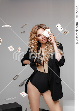 Attractive lady in black lingerie and jacket Attractive lady in black lingerie and jacket 76153642